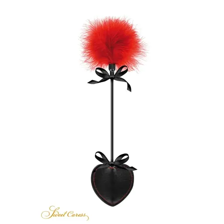 Tapette pique avec pompon rouge