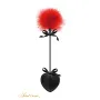 Tapette pique avec pompon rouge
