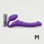 Vibrating bendable strap-on